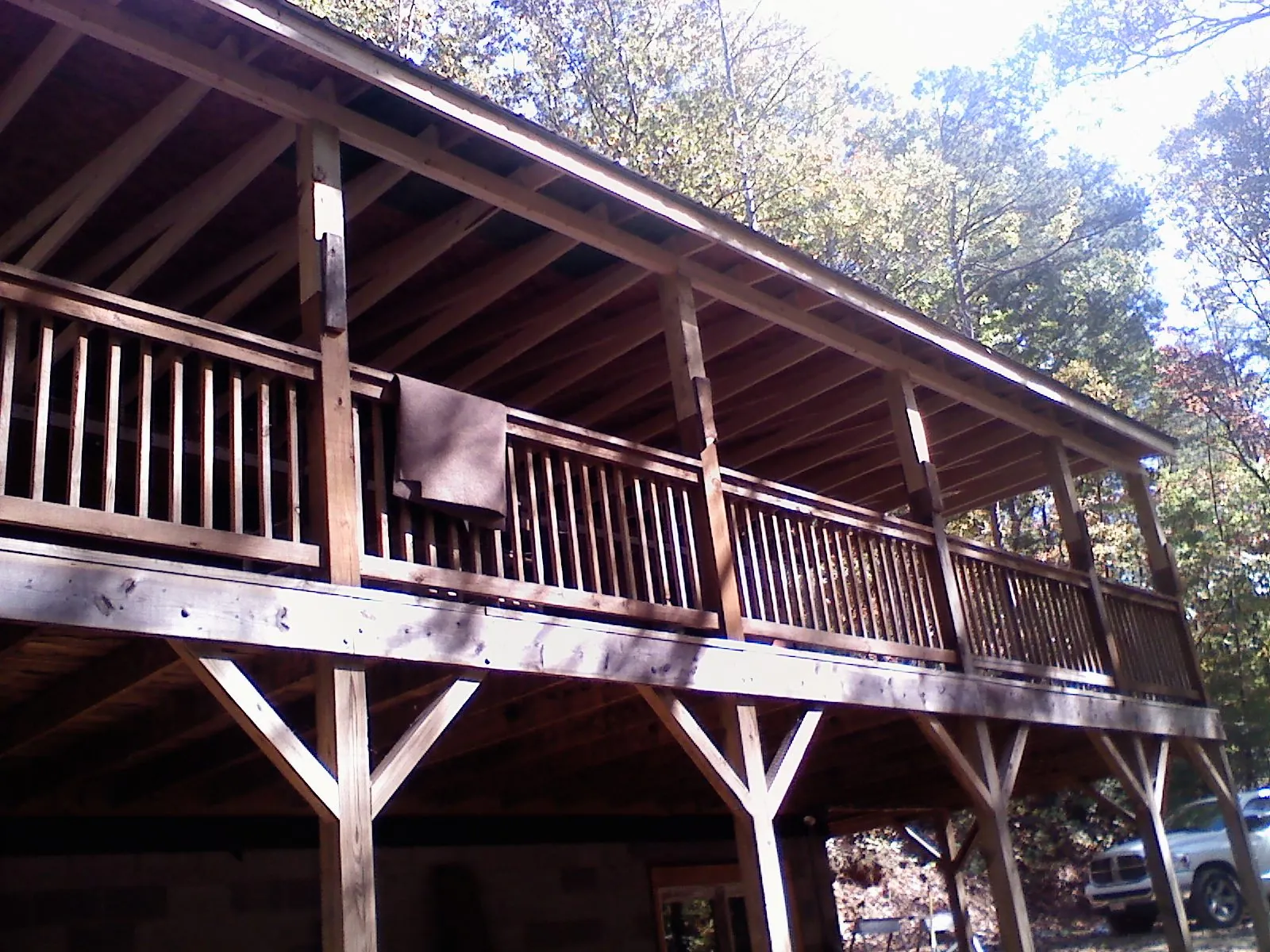 Timber framing under a new elevated porch and deck — Roof Leak Repair in Tipton by Roofing Brothers